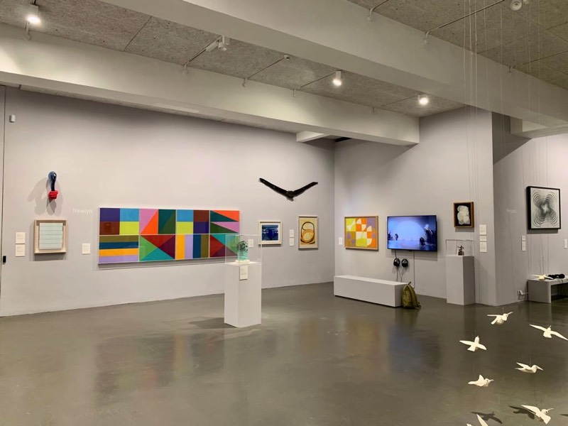 Installion view of a Richard Bell painting with others at Newlyn Art Gallery and The Exchange in Penzance